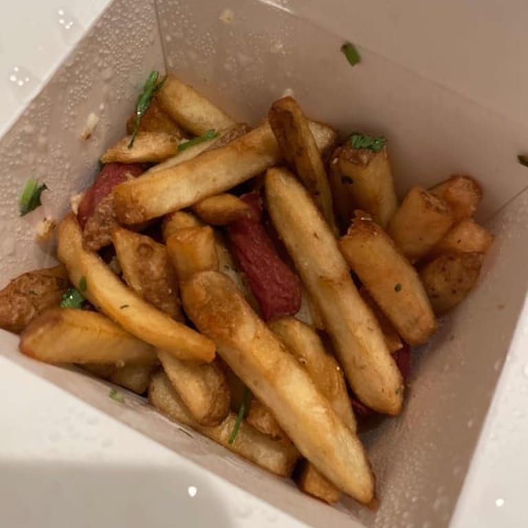 Savor Our Irresistible Salchipapas Dish